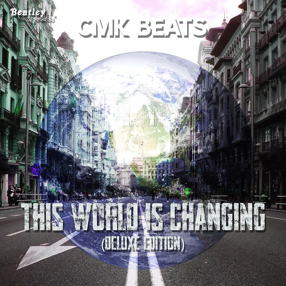 Постер альбома This World Is Changing (Deluxe Edition)